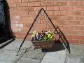 A Buddi hanging basket stand